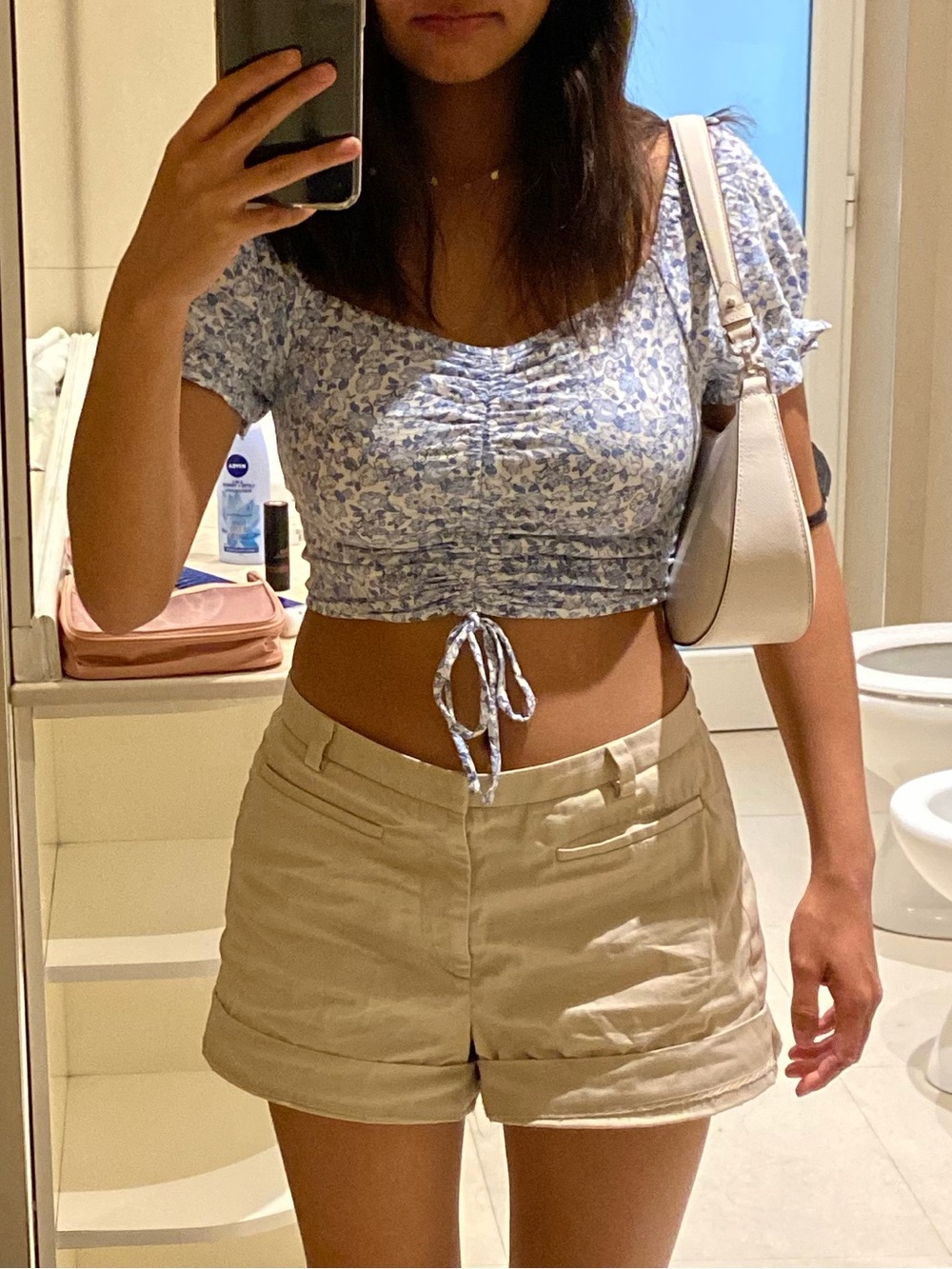 white and blue floral crop top with tie front detail
